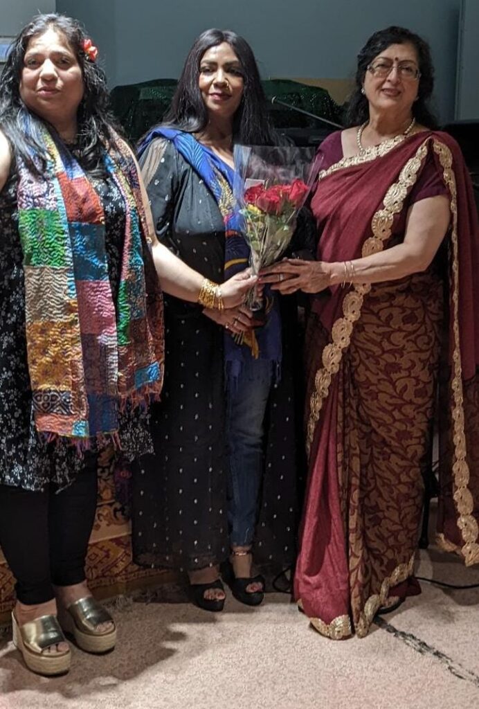 Kavya-Geet Sammelan on June 29, 2022 - Sapana (middle) receiving flowers from Amita Khanna (right) and Dr. Monika Spolia (left)